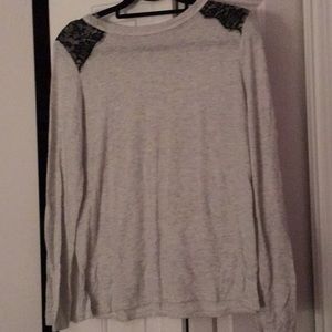 Gray sweater with lace trim on shoulder